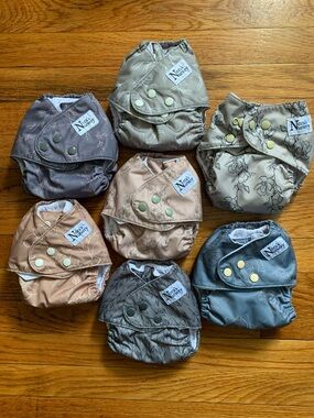 Nora’s nursery Modern Blooms clothe diaper collection